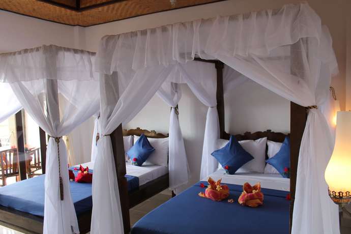Imagen de la habitación del Hotel Titi Sedana Homestay. Foto 16