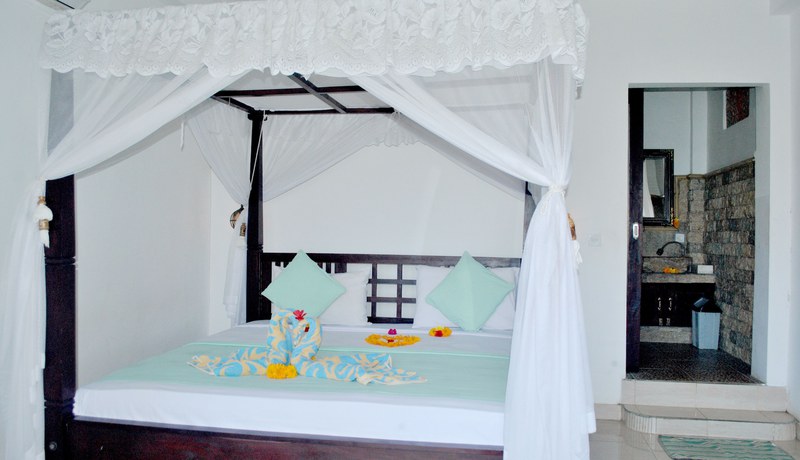 Imagen de la habitación del Hotel Titi Sedana Homestay. Foto 18