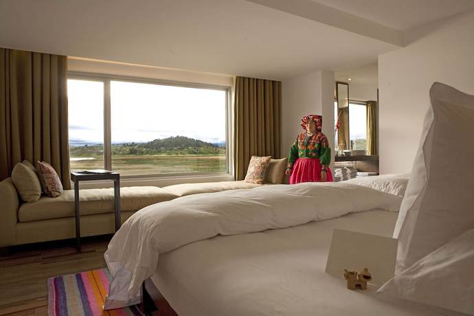 Imagen de la habitación del Hotel Titilaka. Foto 13