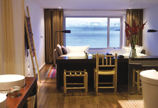 Imagen de la habitación del Hotel Titilaka. Foto 19