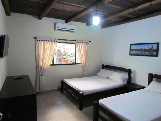 Imagen de la habitación del Hotel Tiuma Park. Foto 11