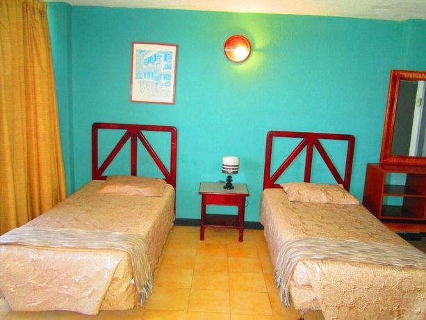 Imagen de la habitación del Hotel Tiuna. Foto 16