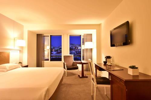 Imagen de la habitación del Hotel Tivoli Coimbra Hotel. Foto 10