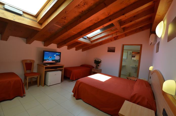 Imagen de la habitación del Hotel Tivoli, Lignano Sabbiadoro. Foto 5