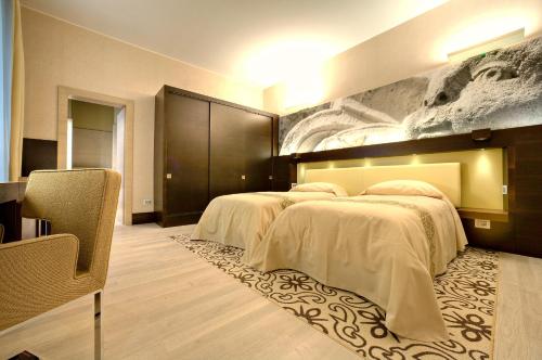 Imagen de la habitación del Hotel Tivoli Palazzo 1880 Lecce. Foto 9