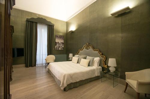 Imagen de la habitación del Hotel Tivoli Palazzo 1880 Lecce. Foto 18