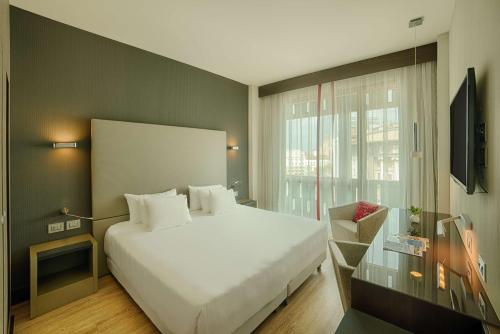 Imagen de la habitación del Hotel Tivoli President Milano. Foto 12