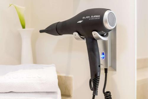 Imagen de la habitación del Hotel Tivoli President Milano. Foto 16