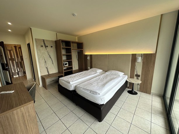 Imagen de la habitación del Hotel Tiziana. Foto 6