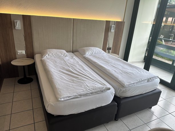 Imagen de la habitación del Hotel Tiziana. Foto 7