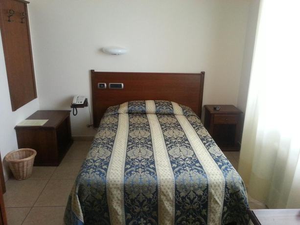 Imagen de la habitación del Hotel Tiziana. Foto 9