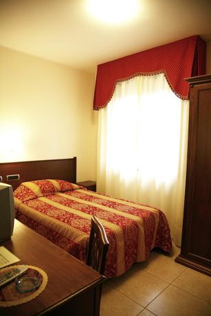 Imagen de la habitación del Hotel Tiziana. Foto 15