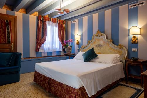 Imagen de la habitación del Hotel Tiziano, Venecia. Foto 7