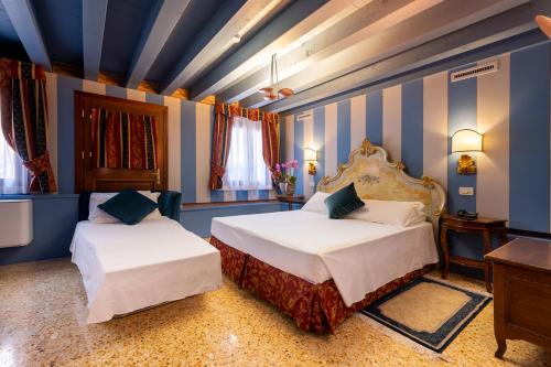 Imagen de la habitación del Hotel Tiziano, Venecia. Foto 10