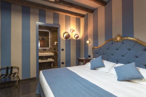 Imagen de la habitación del Hotel Tiziano, Venecia. Foto 13
