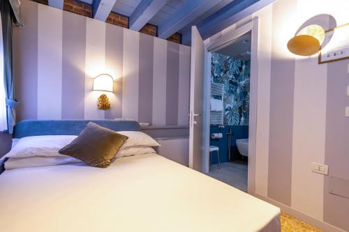 Imagen de la habitación del Hotel Tiziano, Venecia. Foto 15