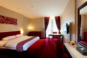 Imagen de la habitación del Hotel Tjokro Klaten. Foto 10