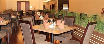 Imagen del bar/restaurante del Hotel Tjokro Klaten. Foto 3