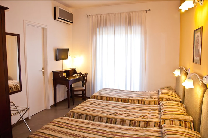 Imagen de la habitación del Hotel Tk. Foto 7