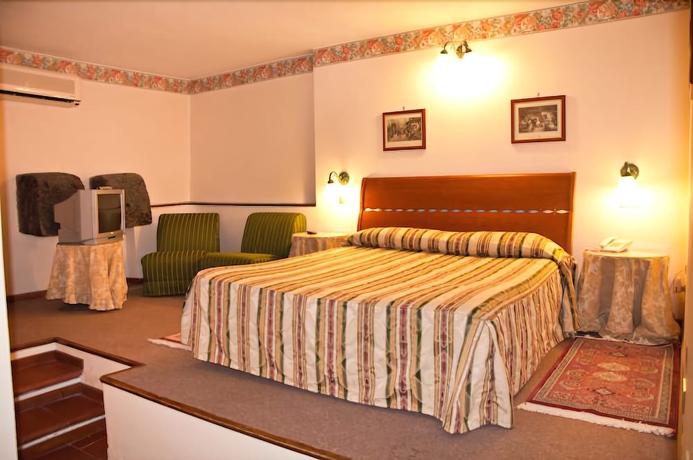 Imagen de la habitación del Hotel Tk. Foto 8