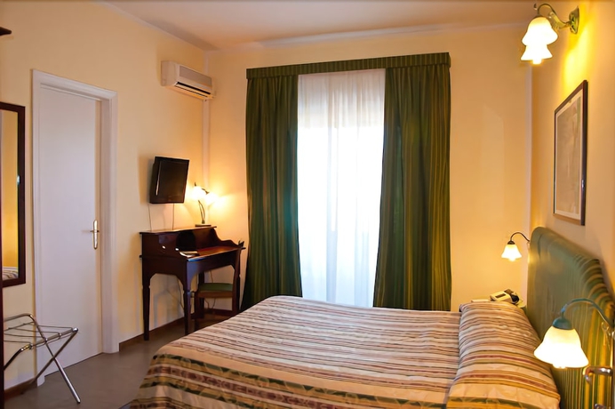 Imagen de la habitación del Hotel Tk. Foto 13