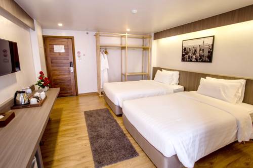 Imagen de la habitación del Hotel Tk Palace and Convention. Foto 13