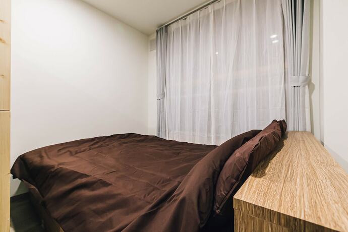 Imagen de la habitación del Hotel Tkd House Asahikawa. Foto 19