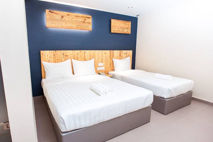 Imagen de la habitación del Hotel Tlj. Foto 11
