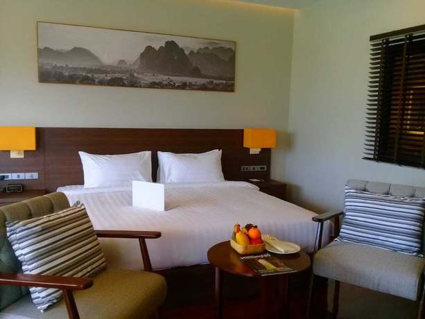 Imagen de la habitación del Hotel Tmark Resort Vang Vieng. Foto 4