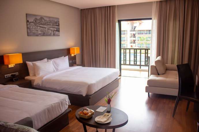 Imagen de la habitación del Hotel Tmark Resort Vang Vieng. Foto 8