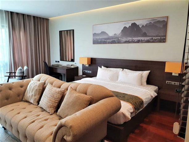 Imagen de la habitación del Hotel Tmark Resort Vang Vieng. Foto 9