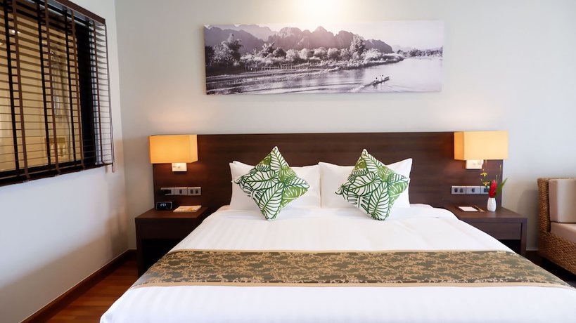 Imagen de la habitación del Hotel Tmark Resort Vang Vieng. Foto 11