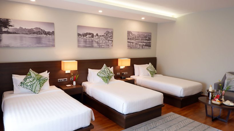 Imagen de la habitación del Hotel Tmark Resort Vang Vieng. Foto 12