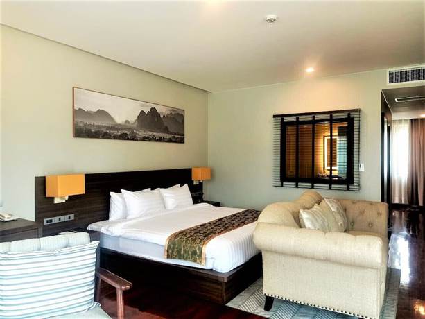 Imagen de la habitación del Hotel Tmark Resort Vang Vieng. Foto 16