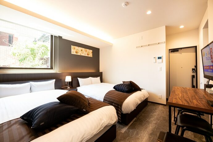 Imagen de la habitación del Hotel T&middot; K Square Kagoshima Chuo. Foto 18