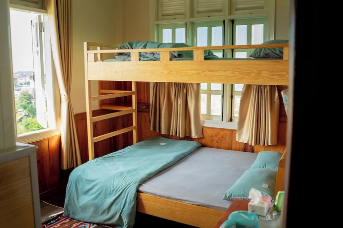Imagen de la habitación del Hotel To Chim Homestay Da Lat. Foto 2