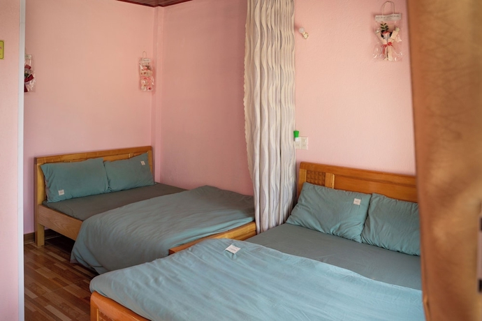 Imagen de la habitación del Hotel To Chim Homestay Da Lat. Foto 11