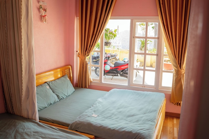 Imagen de la habitación del Hotel To Chim Homestay Da Lat. Foto 12