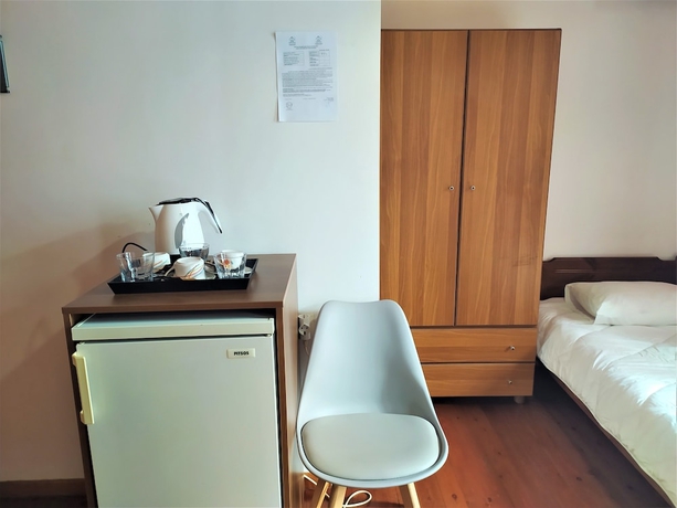 Imagen de la habitación del Hotel To Diporto. Foto 7