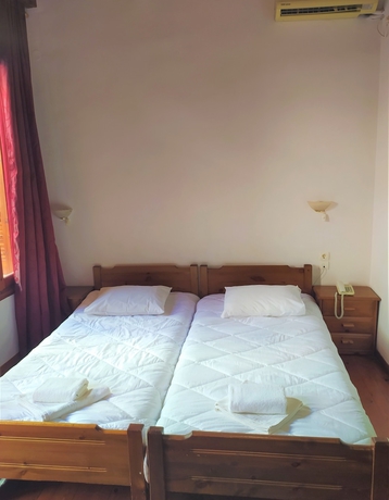 Imagen de la habitación del Hotel To Diporto. Foto 10