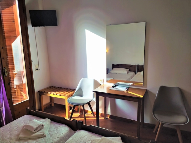 Imagen de la habitación del Hotel To Diporto. Foto 13