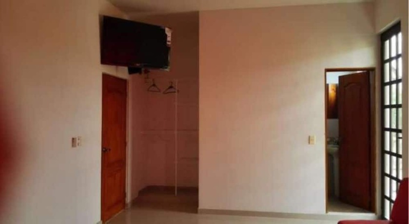 Imagen de la habitación del Hotel Tocaima Suit By Rotamundos. Foto 2