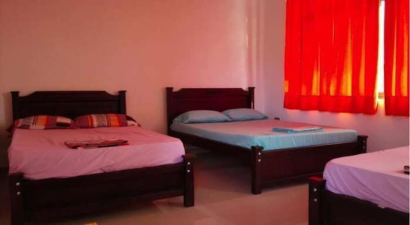Imagen de la habitación del Hotel Tocaima Suit By Rotamundos. Foto 3