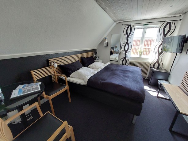 Imagen de la habitación del Hotel Tofteg&aring;rden Guesthouse. Foto 7