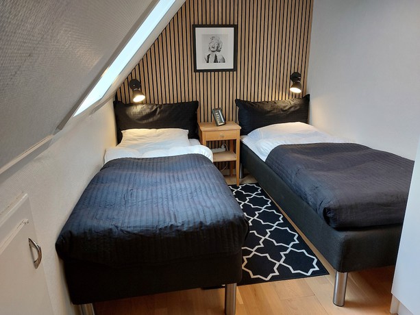 Imagen de la habitación del Hotel Tofteg&aring;rden Guesthouse. Foto 17