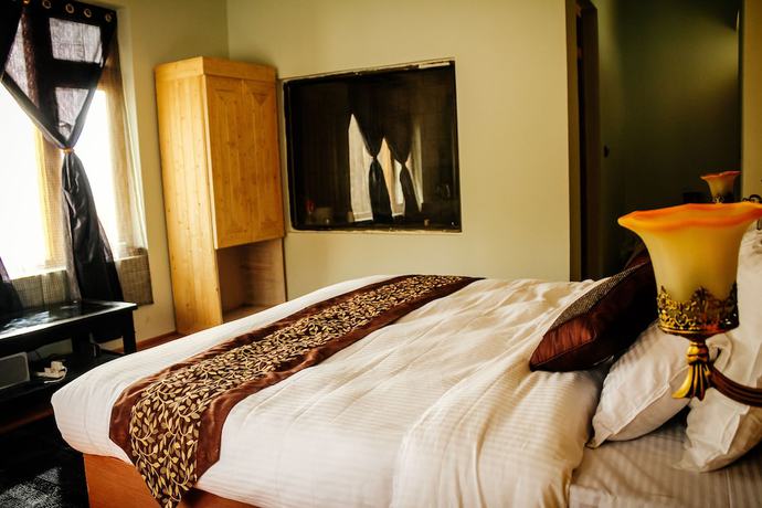 Imagen de la habitación del Hotel Togochey Boutique. Foto 14