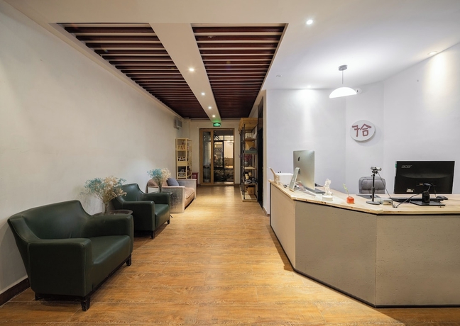Imagen de los interiores del Hotel Togruo Ge Qi Shi Inn. Foto 10