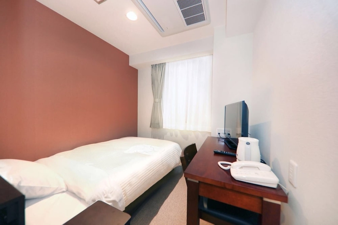 Imagen de la habitación del Hotel Toho. Foto 5