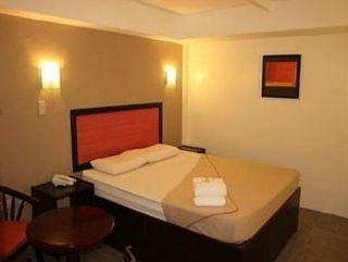 Imagen de la habitación del Hotel Toilena Room and Board. Foto 2