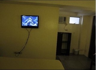 Imagen de los interiores del Hotel Toilena Room and Board. Foto 16